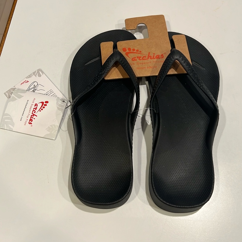 New with tags flip flops